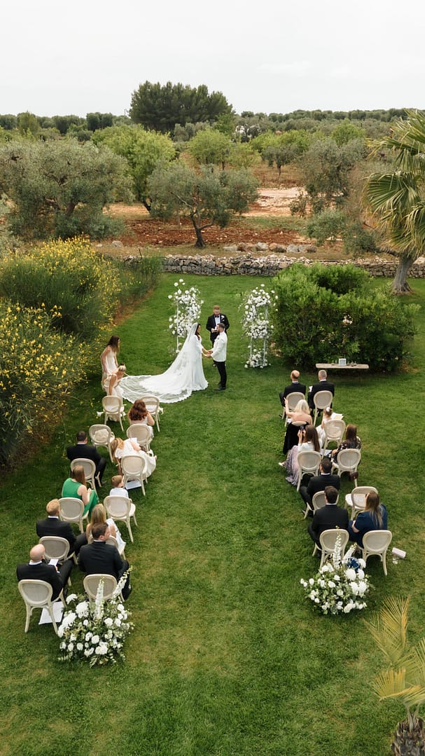 Couple having a moment during outdoors garden ceremony in Italy, London wedding photographer