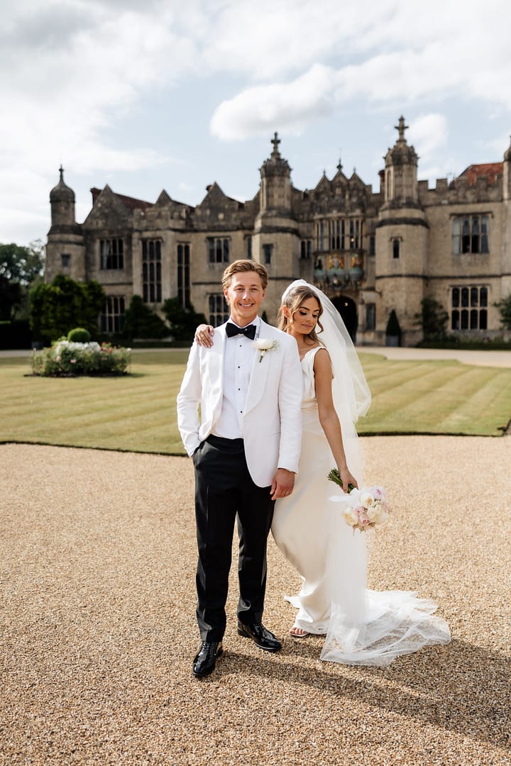 Romantic golden hour portrait of couple at London venue, taken by London wedding photographer using film and digital