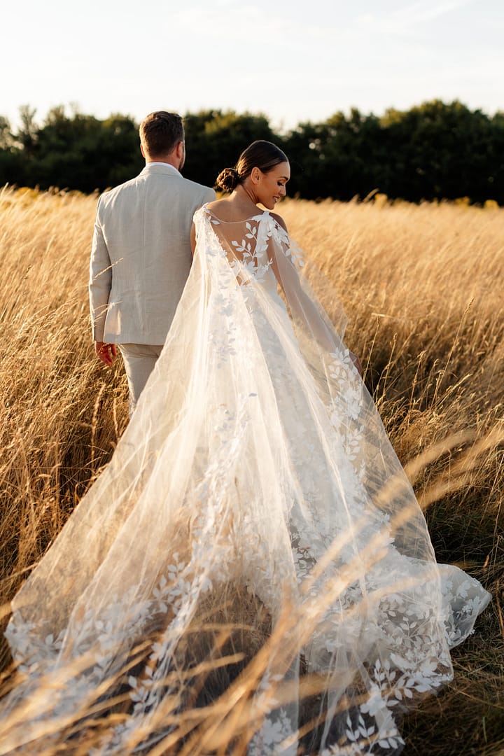 Romantic golden hour portrait of couple at London venue, taken by London wedding photographer using film and digital
